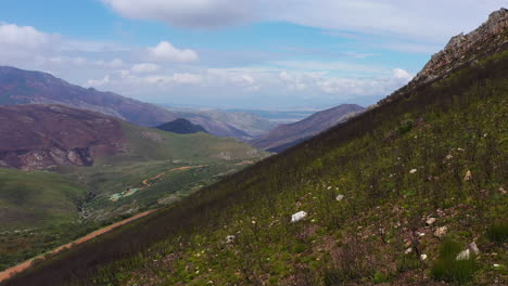 Aerial-shot-along-mountains-burned-vegetation-South-Africa