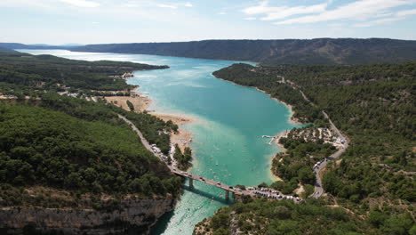 Verdon-river-flows-into-the-artificial-Lake-of-Sainte-Croix-aerial-France-sunny