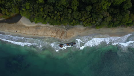 Aerial-top-shot-view:-Tropical-shipwreck-on-a-beach,-Puerto-Viejo.