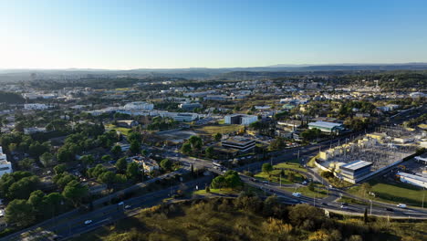 Aerial-view-of-Montpellier-showcasing-its-urban-landscape-under-a-clear-blue-sky