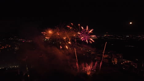 Overhead-shot-of-Montpellier-bathed-in-the-glow-of-a-spectacular-fireworks-show.