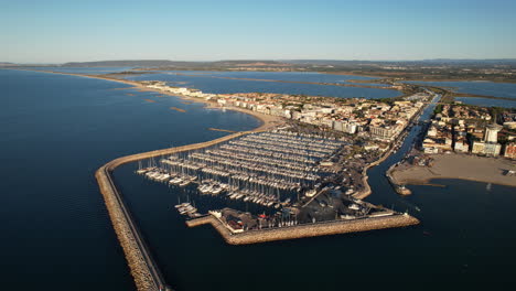 Stunning-aerial-view-of-Palavas-les-flots-showcasing-the-marina-filled-with-boat