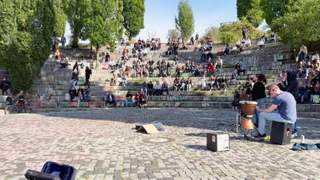Street-Musicians-in-Berlin-Playing-Songs-in-Open-Air-Theater-in-Public