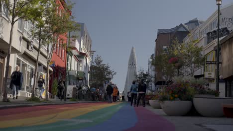 Rainbow-road-in-Skolavordustigur-street,-Hallgrímskirkja-church,-Reykjavik-Iceland