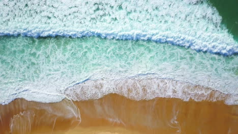 Cinematic-aerial-drone-looking-down-circling-stunning-blue-water-golden-sand-beach-coastline-morning-surfe-huge-glassy-waves-crashing-swell-surf-Hossegor-Seignosse-France-Biarritz-Basque-Country