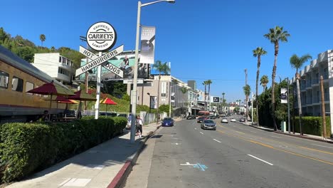 Carney's-hot-dog-and-burger-restaurant-in-a-yellow-Union-Pacific-rail-car-on-Sunset-Boulevard