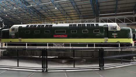 hand-held-shot-of-a-historic-train-inside-the-National-Railway-Museum-In-York