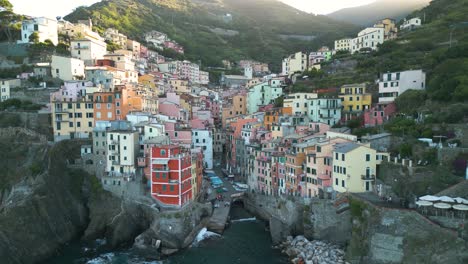 Aerial-Pullback-Reveals-Incredible-Town-of-Riomaggiore-in-Cinque-Terre,-Italy