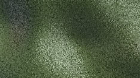 Green-Textured-Canvas-In-Waving-Motion