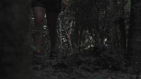 Girl-walking-and-exploring-the-forest,-slow-motion