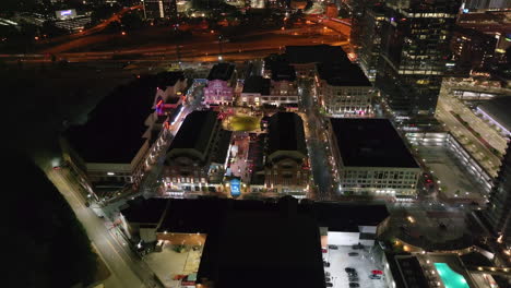 Forwards-fly-above-Atlantic-Station-mall-at-night