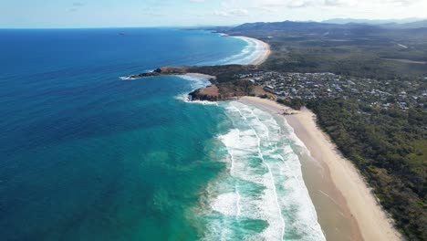 Turquoise-Seascape-Of-Emerald-Beach-In-New-South-Wales,-Australia---aerial-shot