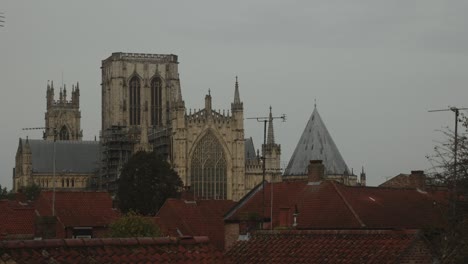 Hand-held-shot-of-york-minster-on-a-overcast-day-and-houses-in-the-foreground
