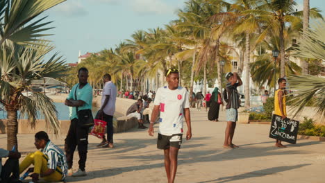 Locals-walking-along-the-Stone-Town-promenade