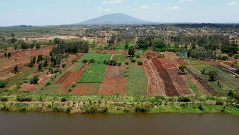 Lake-Next-To-Agricultural-Fields-With-Mountain-View-In-Africa