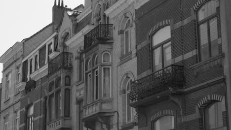 Low-angle-of-bow-window-architectural-details-in-Brussels,-Belgium