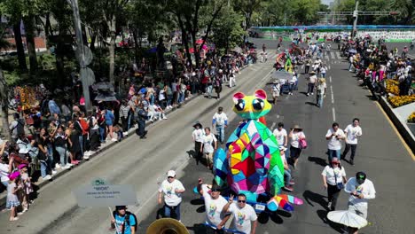 Dron-footage-over-a-very-colorful-alebrije-during-the-Alebrije-parade-at-Mexico-city