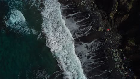 Cinematic-4K-aerial-drone-video-of-black-beach-and-rolling-waves---taken-in-Benijo,-Tenerife