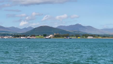 Sailing-Serenity:-Exploring-Greencastle-with-Ships-and-Sailboats-on-a-Sunny-Day-Amidst-the-Stunning-Backdrop-of-the-Mourne-Mountains-and-Coastal-Scenery