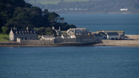 Mid-shot-of-harbour-buildings-on-St-Michael's-mount-taken-from-the-village-of-Marazion