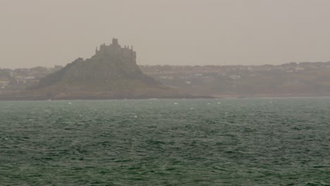 distant-misty-shot-of-Saint-Michael's-mount-taken-at-mousehole-Cornwall