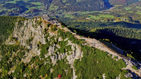 Aerial-view-passing-the-Kehlsteinhaus,-the-Eagle's-Nest-building,-fall-in-Germany