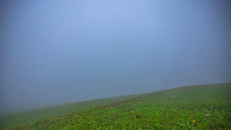 Timelapse-of-an-eerie,-foggy,-and-mysterious-countryside-landscape