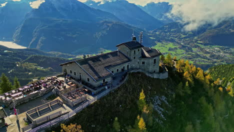 Aerial-view-tilting-away-from-the-Kehlsteinhaus-building,-autumn-in-Germany