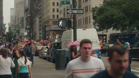 East-59th-street-crosswalk-intersection-with-tourists-and-businessmen