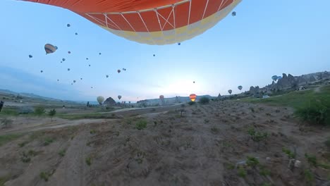 balloon-trip-over-cappadocia-turkey,-rocky-landscape
