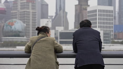 Couple-at-the-Bund-Days-Before-Covid-19-Lockdown-in-2022-in-Shanghai,-China