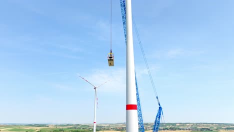Wind-Turbine-Nacelle-Lifted-By-Crawler-Crane-For-Installation-At-Wind-Power-Plant