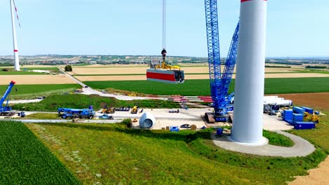 Crawler-Crane-Lifting-Nacelle-At-Wind-Turbine-Installation-Site