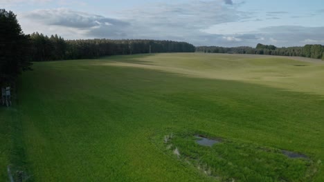 Green-Pastures-In-Countryside-Warmia,-Poland---aerial-drone-shot