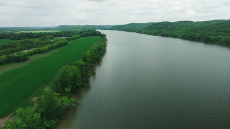 Scenic-River-And-Field-In-Mousetail-Landing-State-Park,-Linden,-Tennessee,-USA---aerial-shot