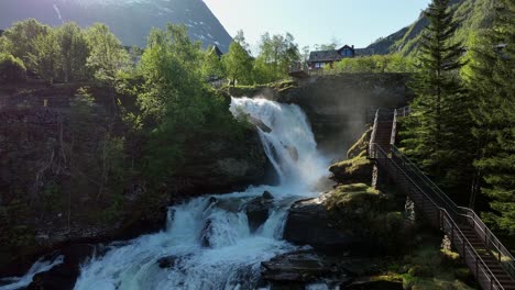 Aerial-over-tiered-waterfall,-Geiranger,-Norway