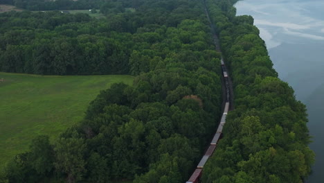 Aerial-View-Over-Train-Traveling-Near-Spadra-Park-In-Clarksville,-Arkansas---drone-shot
