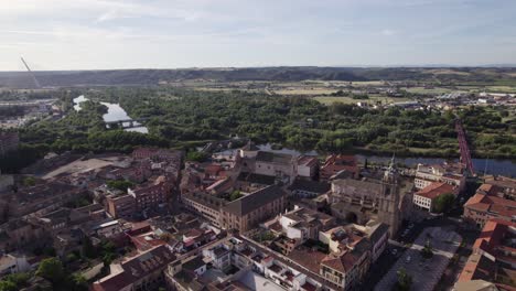 Scenic-drone-view-of-Talavera-outskirts,-mirror-like-river-tagus-and-countryside