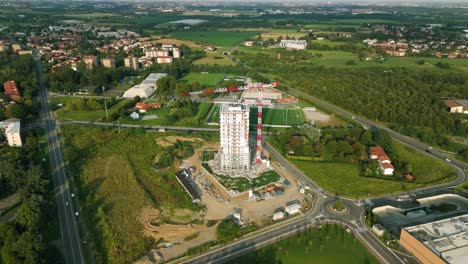 Crane-for-construction-of-residential-Torre-del-Verde-skyscraper-in-Vimercate,-Brianza-in-Italy