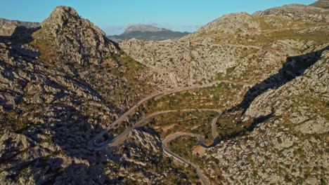 Winding-Road-Of-Nus-de-sa-Corbata-At-Coll-dels-Reis-Rocky-Mountainscape-In-Mallorca,-Balearic-Islands,-Spain