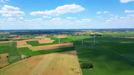 Aerial-view-of-powerful-Wind-turbine-farm-for-energy-production-on-beautiful-cloudy-sky-at-highland