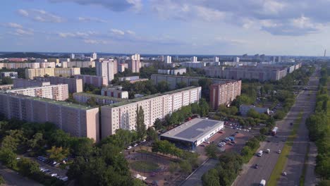 Nice-aerial-top-view-flight-Large-panel-system-building-Apartment,-prefabricated-housing-complex,-Berlin-Marzahn-East-German-summer-2023