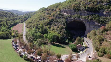Aerial-shot-of-the-touristic-Cave-Mas-d'Azil-in-southern-France