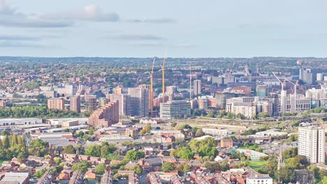 Wide-angle-drone-shot-urban-city-landscape-in-England-on-sunny-day