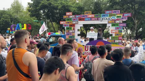 Attendees-happily-watch-the-pride-marching-and-taking-photos-and-videos-of-the-annual-LGBTQ-Taiwan-Pride-Parade-at-Taipei-City-Hall-Plaza