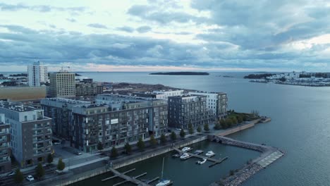 Stone-breakwater-protects-marina-in-trendy-Baltic-waterfront,-Helsinki