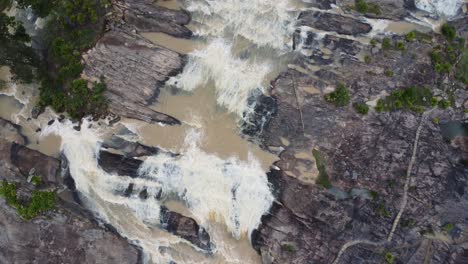 Fly-over-shallow-waterfall-in-Madagascar,-Africa