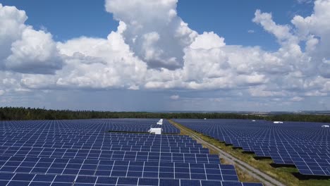 Drone-Flying-Over-Solar-Panels-On-Solar-Farm---Green-Sustainable-Energy
