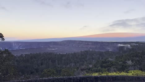 Cinematic-wide-panning-shot-from-Mauna-Loa-to-Kilauea-from-Volcano-House-at-sunrise-in-Hawai'i-Volcanoes-National-Park