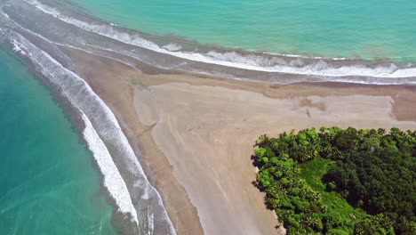 Top-down-Aerial-view-of-the-tropical-Whale-Tail-Beach-in-the-national-park-of-Marino-Ballena